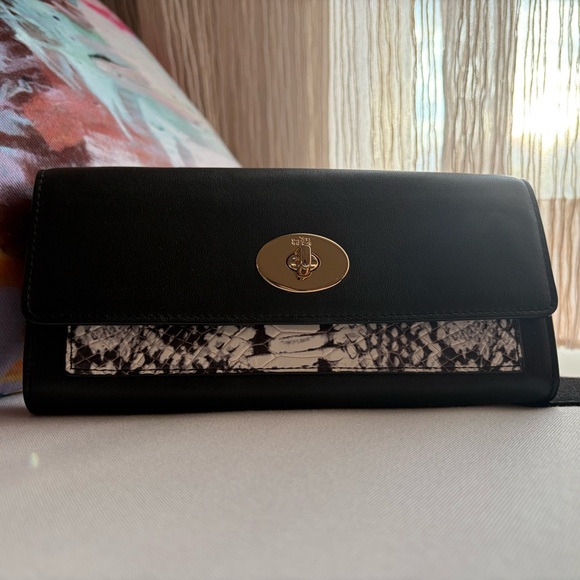 Handbags - Coach Black with snake skin detail long wallet/clutch can be wear crossbody